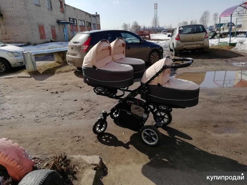 Коляска для тройни
